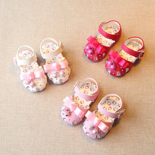 Sandale bebelusi cu element metalic si panglica pentru fete