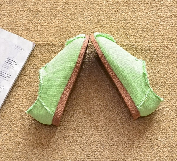 Jauna modeļa ikdienas tekstila apavu noapaļots modelis