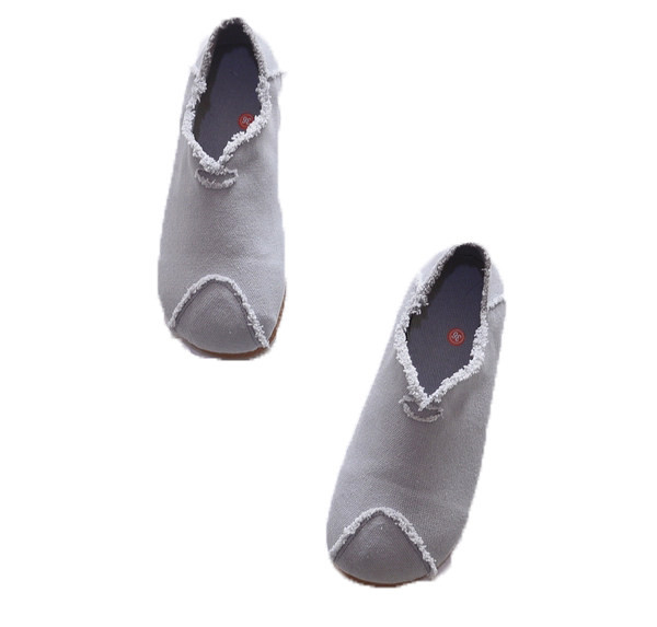 Jauna modeļa ikdienas tekstila apavu noapaļots modelis