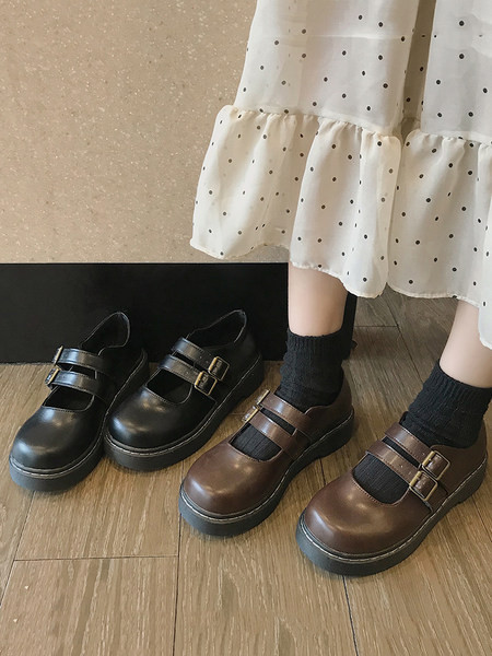 Sieviešu ādas apavi ar sprādzi brūnā un melnā krāsā