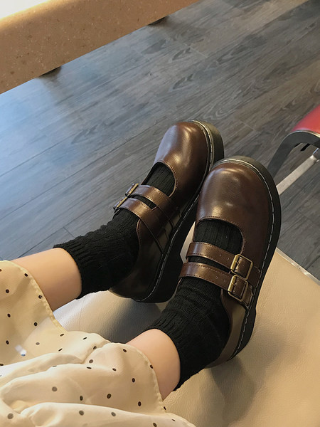 Sieviešu ādas apavi ar sprādzi brūnā un melnā krāsā