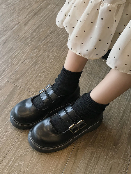 Sieviešu ādas apavi ar sprādzi brūnā un melnā krāsā