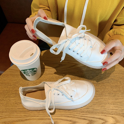 Sieviešu ikdienas elpojoši apavi ar šņorēm un uzrakstu