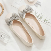 Modernas sieviešu kurpes ar satīna lenti