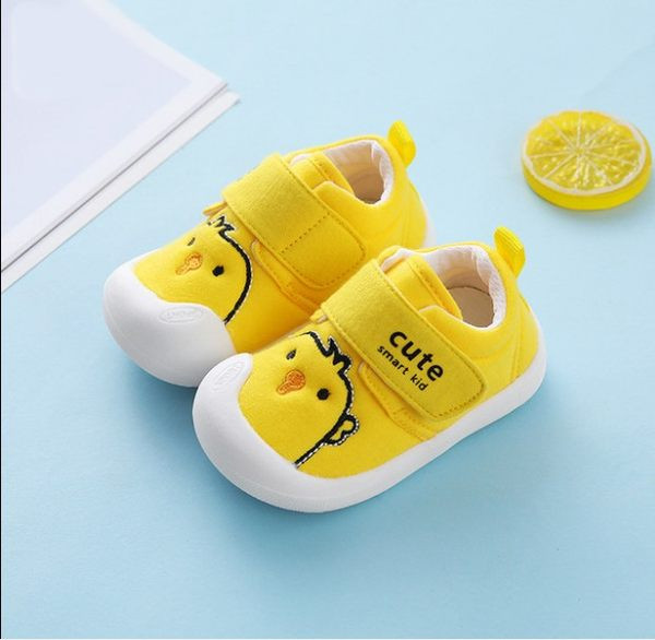 Adidași pentru bebeluși din material textil cu talpă de cauciuc și broderie colorată