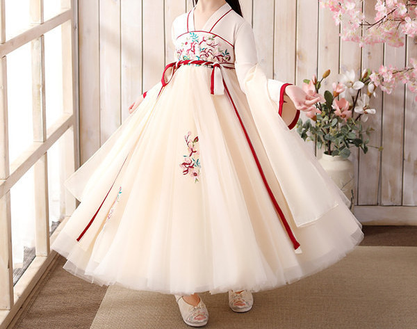 Stilīga bērnu kleita ar izšuvumu mežģīnēm un rāvējslēdzēju mugurpusē