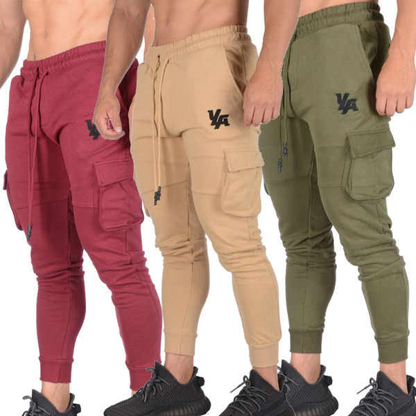 Vīriešu aktuālās sporta bikses ar sānu kabatām un saitēm