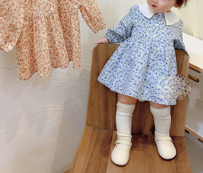 Pavasara bērnu kleita ar ziedu rakstu un pogām meitenēm