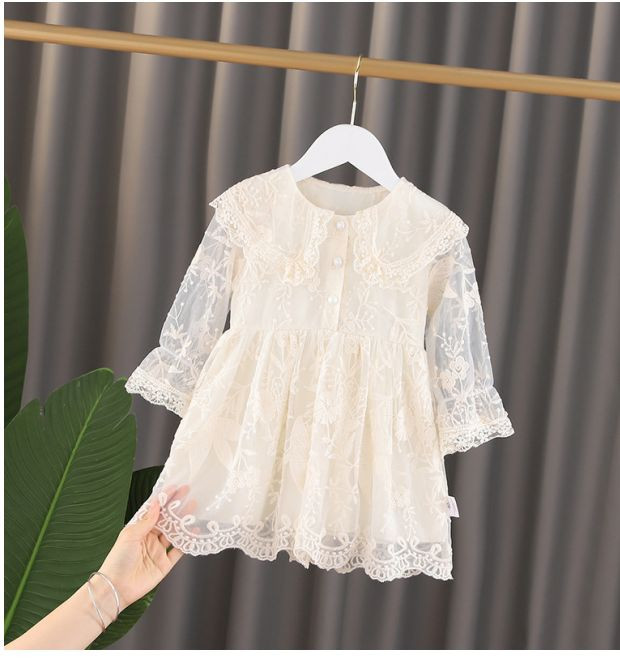 Bērnu mežģīņu kleita ar izšūtām ziedu pogām un ovālu kakla izgriezumu