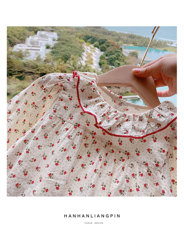 Pavasara ikdienas kleita meitenēm ar garām piedurknēm un lokām