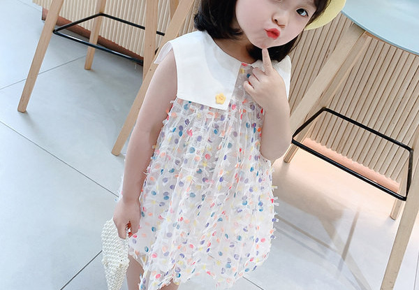 Μοντέρνο παιδικό φόρεμα πουά με στρογγυλή λαιμόκοψη