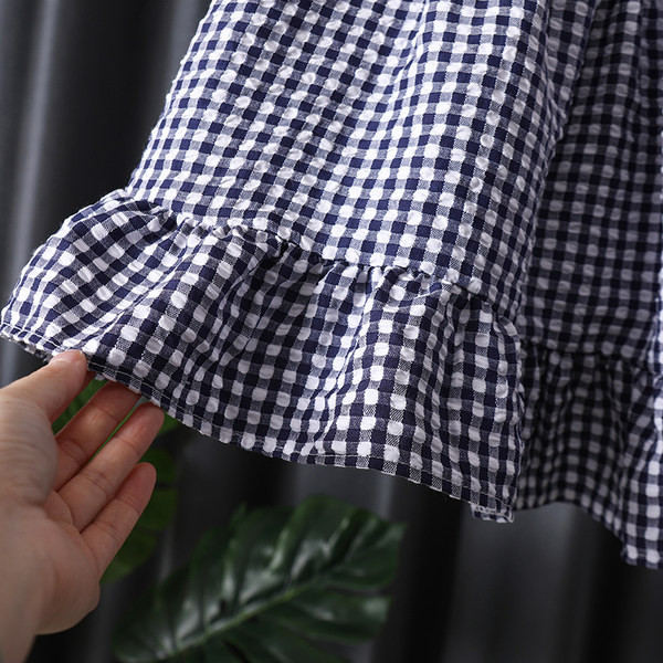 Vasaras rūtainā kleita ar plānām lencītēm