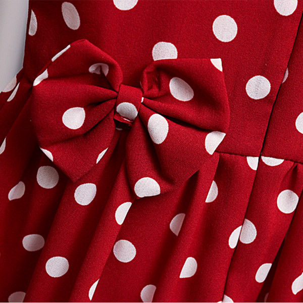 Bērnu punktveida kleita ar apaļu kakla izgriezumu un lentes rotājumu