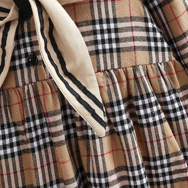 Rūtaina bērnu kleita ar garām piedurknēm - brūnā krāsā