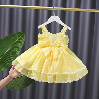 Модерна детска рокля с панделка и презрамки - жълт цвят