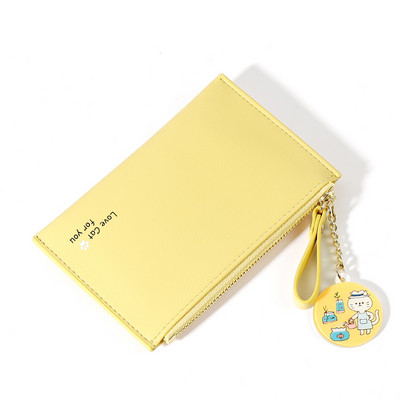 Λεπτό γυναικείο πορτοφόλι με φερμουάρ και αξεσουάρ