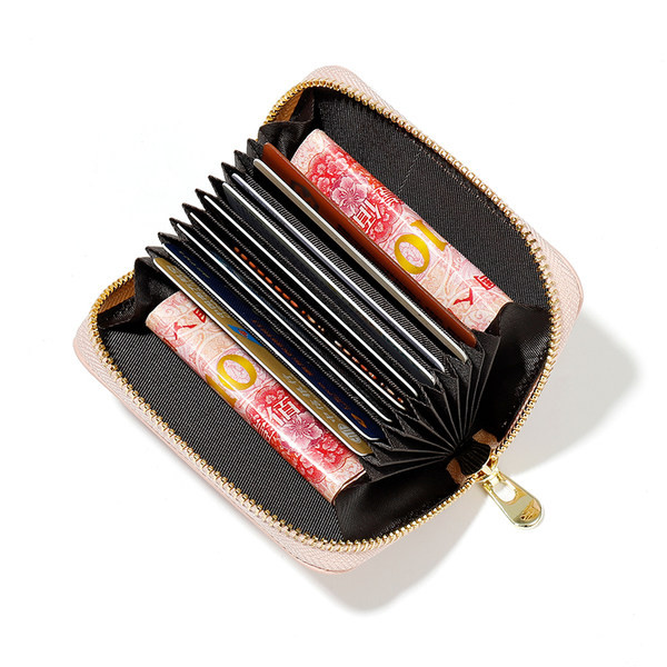 Γυναικείο πορτοφόλι με μεταλλική διακόσμηση και φερμουάρ