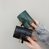 Γυναικείο έκο δερμάτινο πορτοφόλι με μεταλλικό στοιχείο - τρία χρώματα