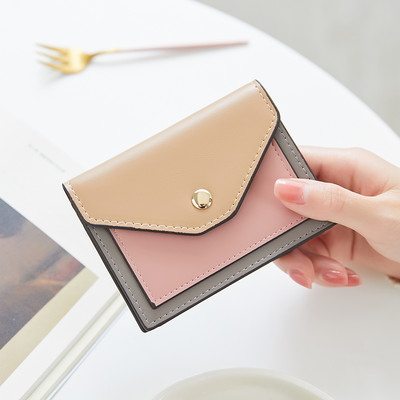 Γυναικείο πορτοφόλι με μεταλλική στερέωση από οικολογικό δέρμα