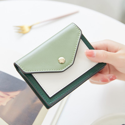 Γυναικείο πορτοφόλι με μεταλλική στερέωση από οικολογικό δέρμα