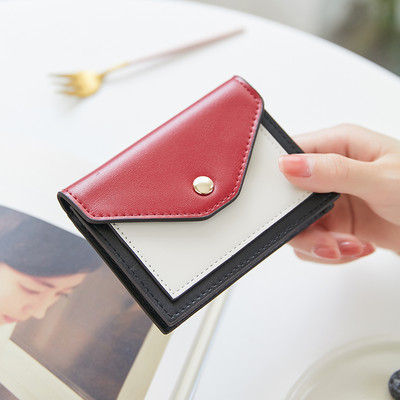 Γυναικείο πορτοφόλι με μεταλλική στερέωση από οικολογικό δέρμα