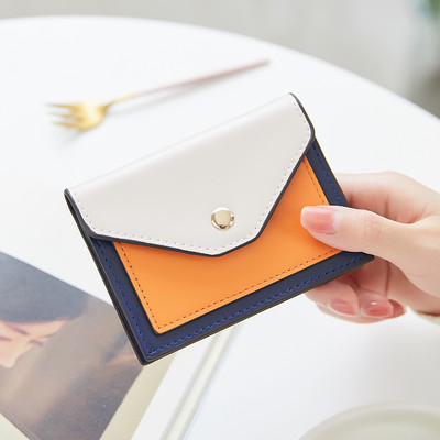 Γυναικείο πορτοφόλι με μεταλλική στερέωση από οικολογικό δέρμα