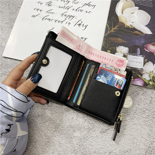 Sieviešu ādas maciņš ar rāvējslēdzēju