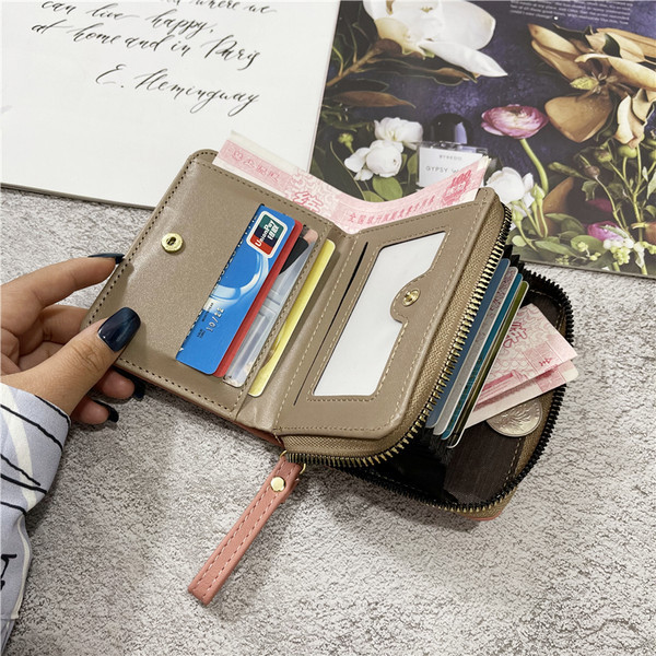 Γυναικείο πορτοφόλι από οικολογικό δέρμα με λαβή και κορδέλα