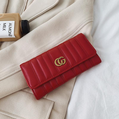 Γυναικείο πορτοφόλι από οικολογικό δέρμα με μεταλλική διακόσμηση σε δύο χρώματα