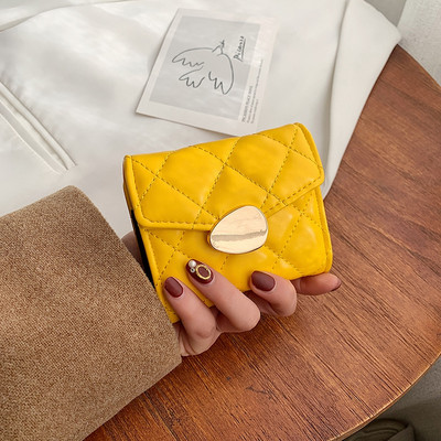 Γυναικείο έκο δερμάτινο πορτοφόλι με μεταλλική στερέωση - κατασκευασμένο από οικολογικό δέρμα