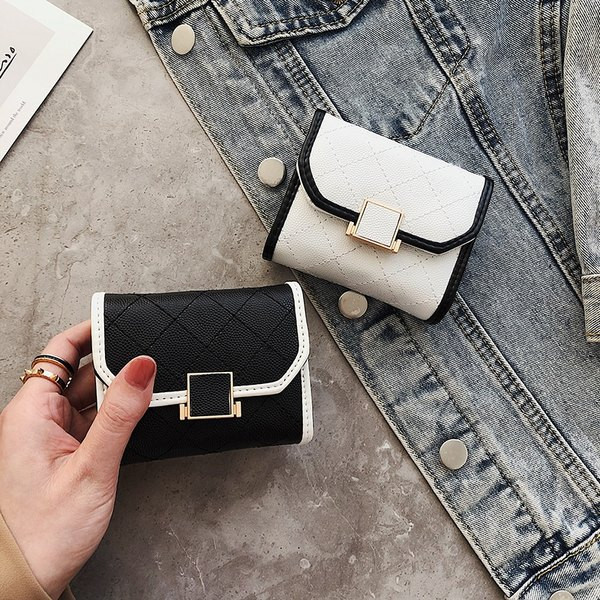 Portofel de dama din piele cu inchidere metalica - patru culori