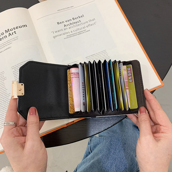 Portofel de dama din piele cu inchidere metalica - patru culori