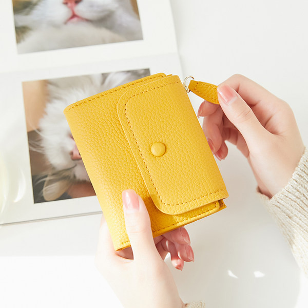 Portofel de dama din piele cu inchidere metalica