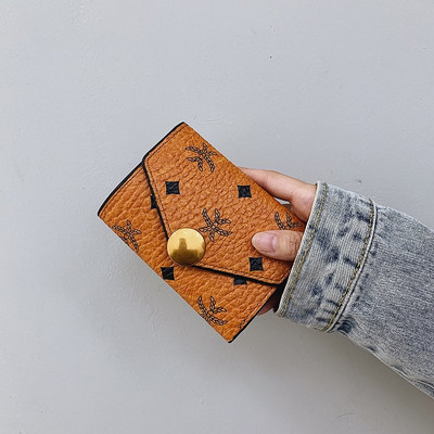 Sieviešu ādas maks ar metāla apdari - trīs krāsas