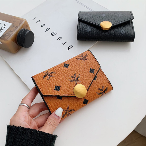 Sieviešu ādas maks ar metāla apdari - trīs krāsas