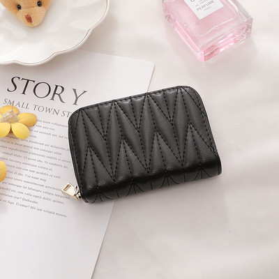 Γυναικείο μίνι πορτοφόλι με φερμουάρ