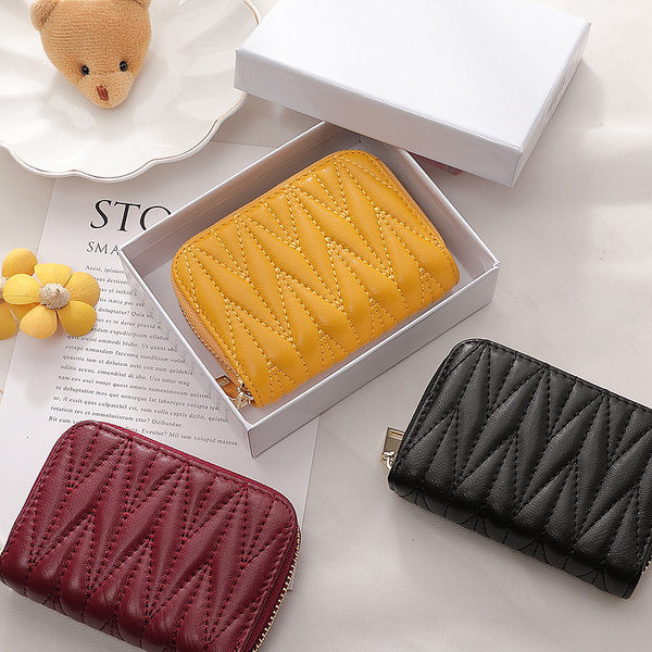 Γυναικείο μίνι πορτοφόλι με φερμουάρ