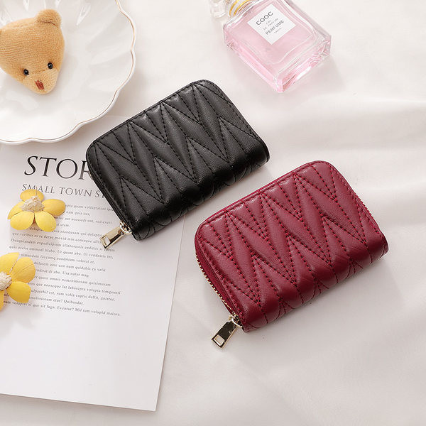 Γυναικείο μίνι πορτοφόλι με φερμουάρ