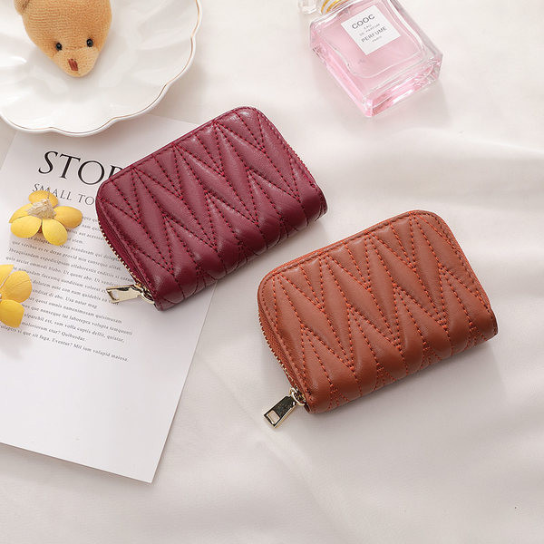 Γυναικείο μίνι πορτοφόλι με φερμουάρ