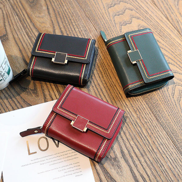 Γυναικείο πορτοφόλι νέο μοντέλο από οικολογικό δέρμα με μεταλλική στερέωση