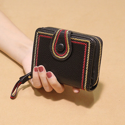 Γυναικείο μίνι πορτοφόλι με κέντημα