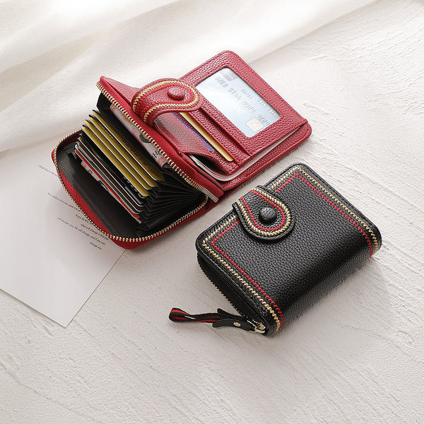 Γυναικείο μίνι πορτοφόλι με κέντημα