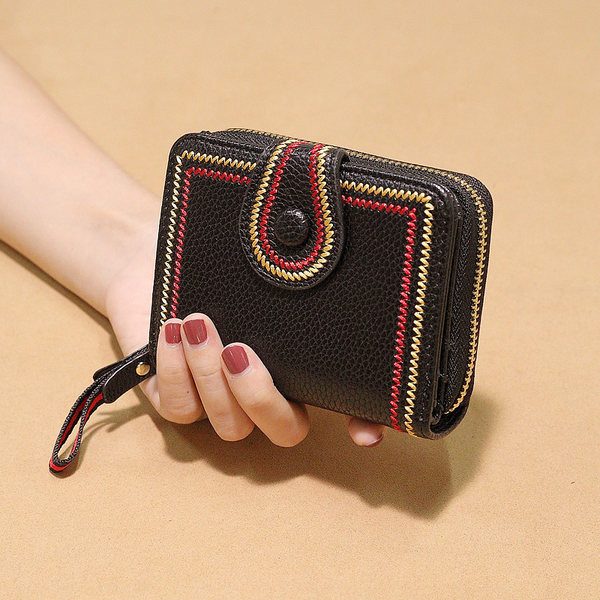 Γυναικείο μίνι πορτοφόλι με κέντημα