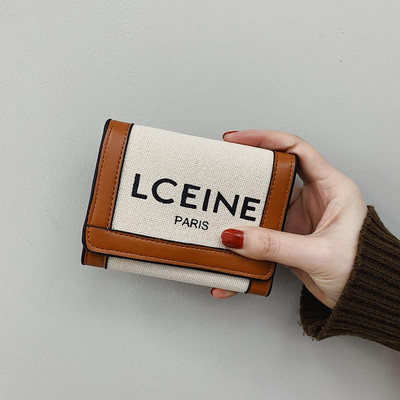 Γυναικείο πορτοφόλι δύο μοντέλα με κεντημένη επιγραφή