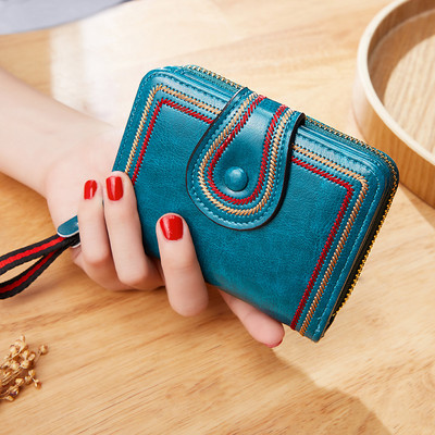 Γυναικείο πορτοφόλι μικρού μεγέθους με μεταλλικό κούμπωμα