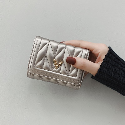 Γυναικείο έκο δερμάτινο πορτοφόλι με μεταλλική διακόσμηση σε τέσσερα χρώματα