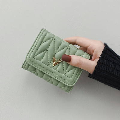 Γυναικείο έκο δερμάτινο πορτοφόλι με μεταλλική διακόσμηση σε τέσσερα χρώματα