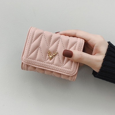 Γυναικείο έκο δερμάτινο πορτοφόλι με μεταλλική διακόσμηση σε τέσσερα χρώματα