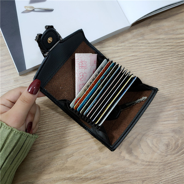 Jauna modeļa sieviešu ādas maciņš ar metāla apdari