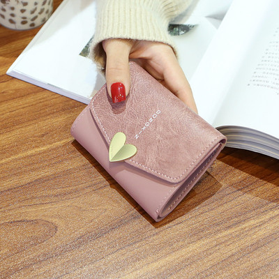 Γυναικείο έκο δερμάτινο πορτοφόλι με μεταλλικό κούμπωμα και φερμουάρ